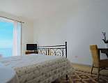 Wunderschöner Ausblick aufs Meer Wunderschöner Ausblick vom Doppelbett einer Suite aufs Meer