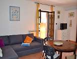 Der Wohnraum mit Zugang zur Terrasse Der Wohnraum mit Zugang zur Terrasse