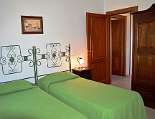 Schlafzimmer mit zwei Einzelbetten Schlafzimmer mit zwei Einzelbetten in der unteren Ferienwohnung