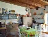 Die Küche mit Zugang zur Terrasse Die Küche mit direktem Zugang zur Terrasse