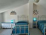 Zweibettzimmer mit zusätzlichem Schlafsofa Zweibettzimmer mit einem zusätzlichem Schlafsofa