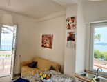 Der Wohnraum mit Zugang zur Terrasse Der Wohnraum mit Zugang zur Terrasse und zum Garten